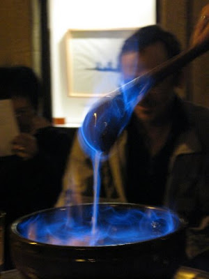 stirring burning alcohol