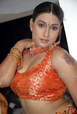 rakshita reentry into film industry with a bag and showing her boobs in pallu less saree very hot to watch
