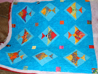 baby quilt with freehand water meander and trapunto effect