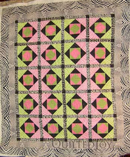 Shelly's Couture quilt, quilted by Angela Huffman