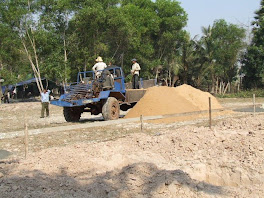 Villagers At Work At School Site