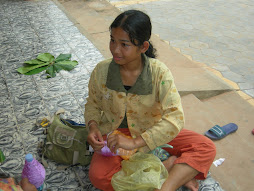 Cambodian Student Weaving 'Embracelets'