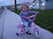 Tylar riding her new bike!  She is a maniac on that thing!  The faster the better!