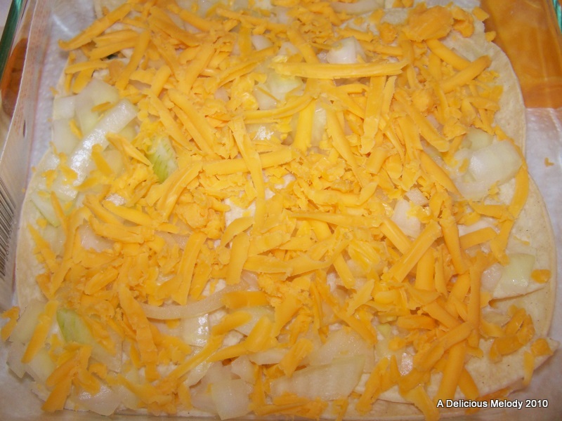 A Delicious Melody Cheese and Onion Enchilada Casserole