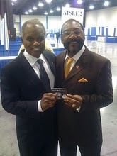 Congressman David Scott’s photo with Honorable Retired Nate Perkins from Magic Power Coffee House