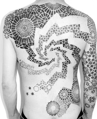 stars and spiral tattoo