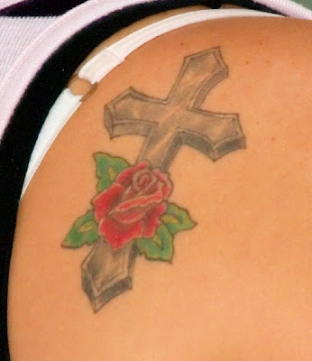 cross tattoos on back of neck. Cross and rose tattoo at the