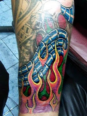 tattoo sleave. flame tattoo on sleeve