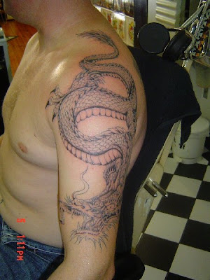 dragon tattoos on arm. dragon tattoos on arm.