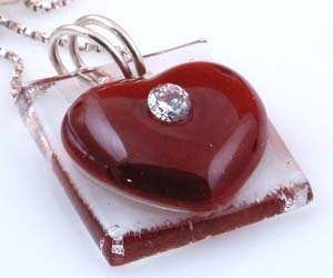 red fused glass heart pendant with clear cz