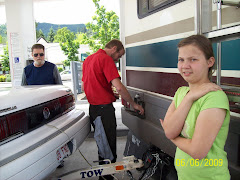 Station attendent fills the motorhome