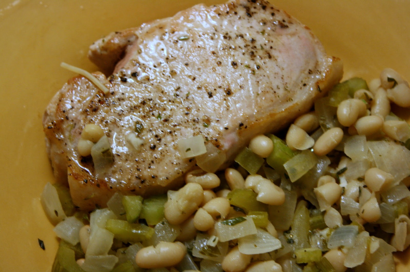 White Bean Provencal with Pork Chop and Pasta The Carnivore and the