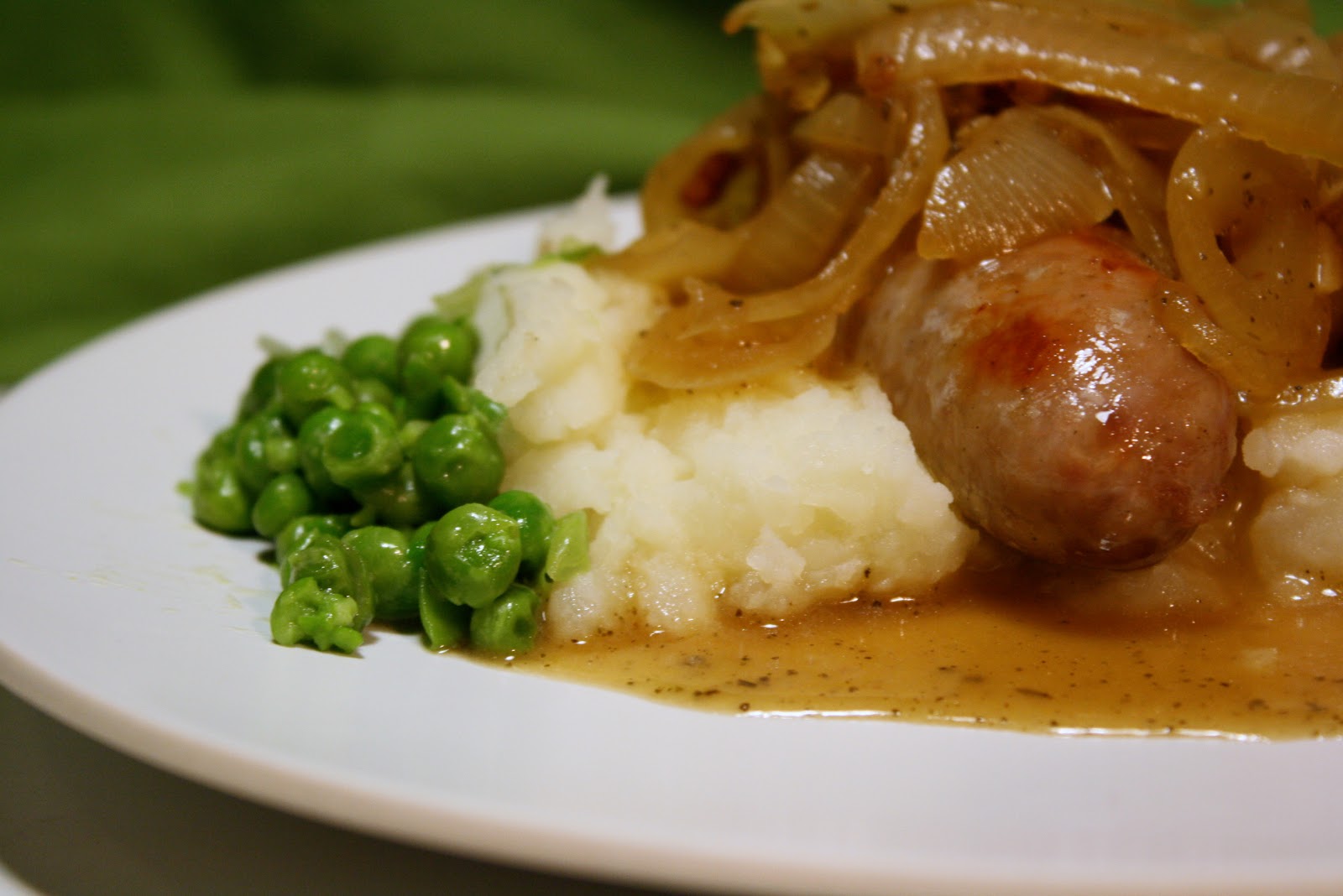 Bangers & Mash with Onion Gravy and Mushy Peas The Carnivore and the