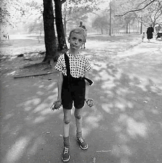 Child with a toy hand grenade in Central Park by Diane Arbus