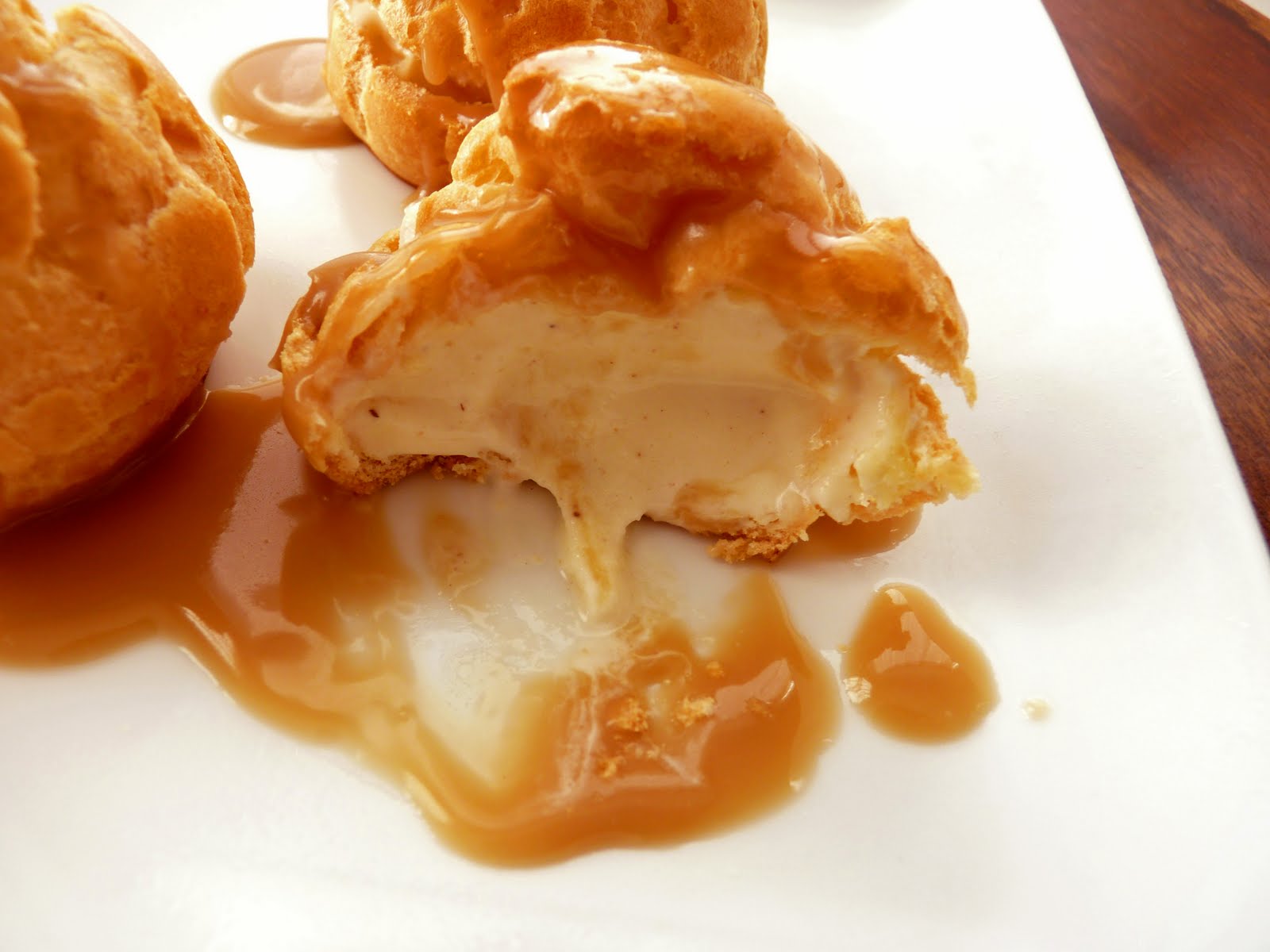 pastry studio Profiteroles with Eggnog Ice Cream and Rum Sauce