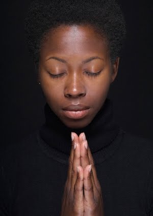 woman-praying-425.jpg?width=328