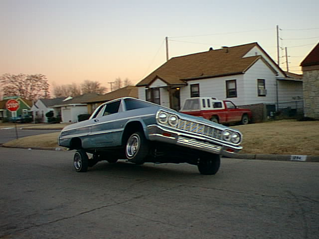 Of course a pimpedout'64 impala lowrider with hydraulics and spinners