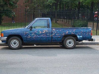 truck last May blue pickup with swirly designs