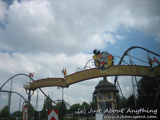 Wearing A Red Dress Otk Boots And Plaid While In Strassbourg