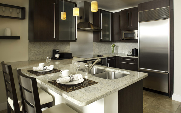 Modern-interior-design-small-compact-kitchen-with-black-kitchen-cabinets-modern-sink-kitchen-appliances-and-kitchen-furniture
