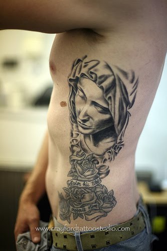 This is an amazing piece of the rib tattoo art that definitely creates a 