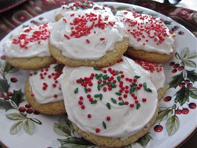 This sugar cookie recipe is so easy to make with your kids. The cookies are soft and chewy and I include a recipe for homemade frosting to make them extra good. #WomenLivingWell #cookies #sugarcookies #kidfriendly