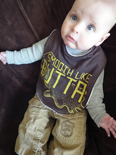 Baby wearing graphic tee shirt bib