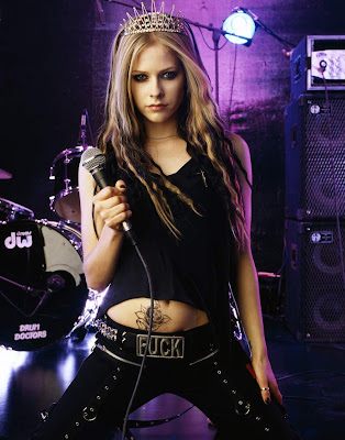 Avril Lavigne Deep Cleavage Posing with Guitar Photos