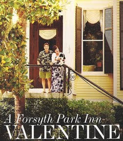 Owners Rick and Lori Blass at entrance to Forsyth Park Inn