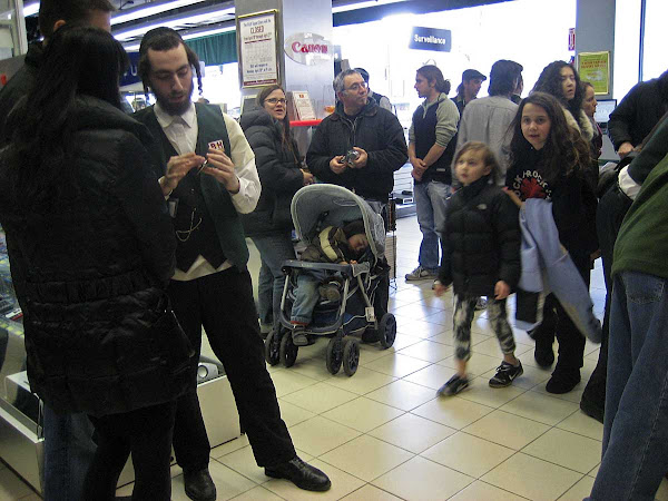 Busy B & H Photo - Friends from out of town (with stroller) pick up parts at the always busy B & H Photo.