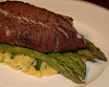 Mulled wine poached cod & lemon-scented asparagus on creamy nam pla spinach polenta