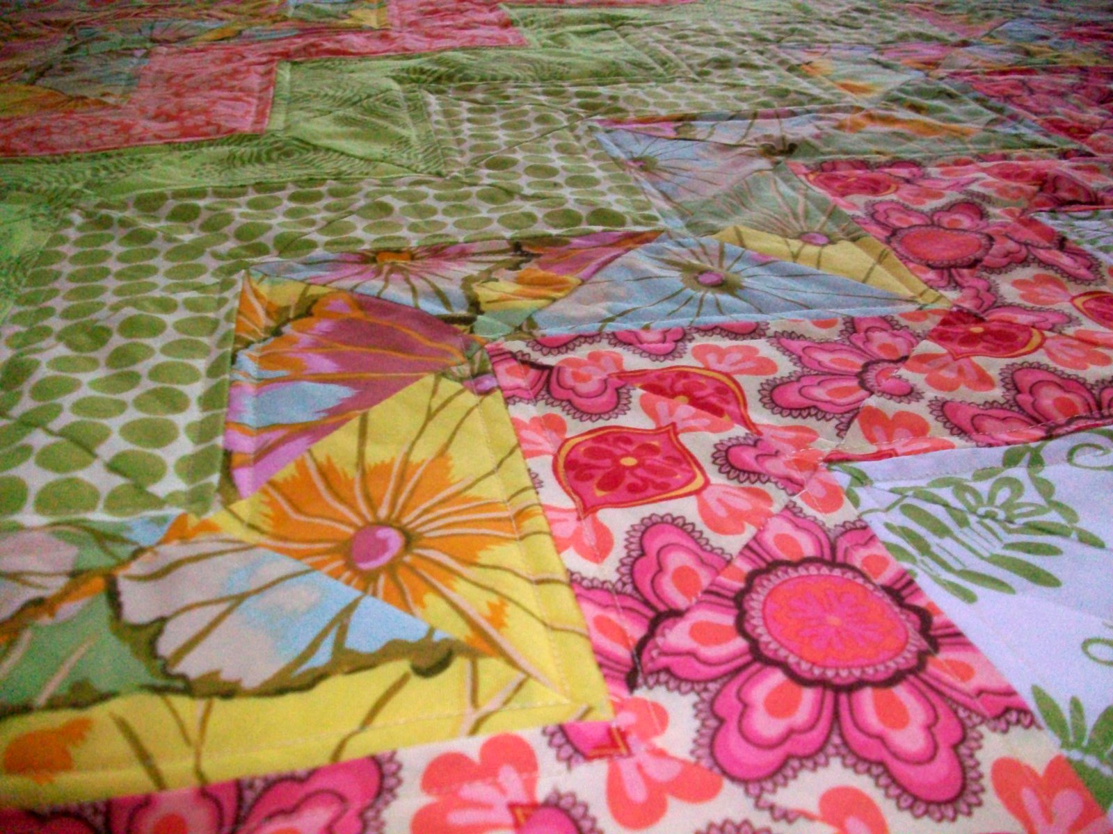 The Johns Family Tangerine Twist Quilt