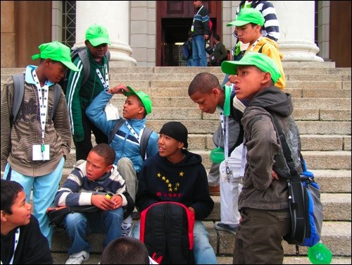 Jack's speaker back pack is the center of attention!  Kids from South Africa watch and ask him stuf