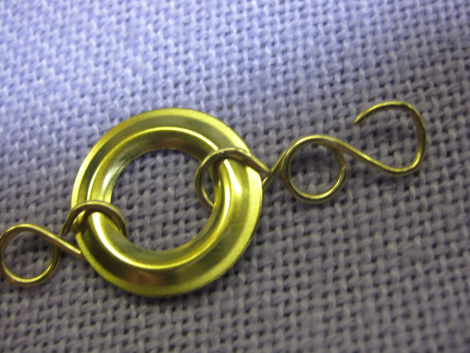 New Jewelry A Day Make a Bracelet from Grommets