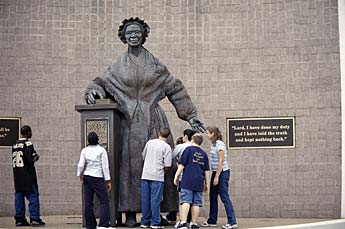 Image of observers at the Sojourner Truth statute in