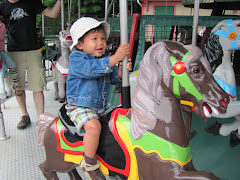 Alexandre on the Marie-go-round at Granby Zoo