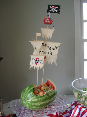 Another idea from One Fabulous Mom a pirate "watermelon" ship.