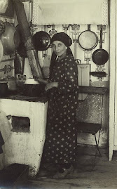 Woman In Her Kitchen
