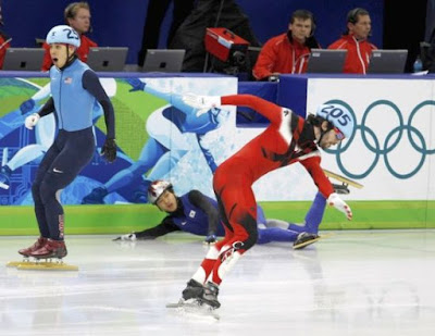 Vancouver+Olympics+26Feb10+US+Apolo+Ohno+SOUTH+KOREA+Sung+Si-bak+CANADA+Charles+Hamelin+gold+500m+short+track+speed+skate-by+Reuters.jpg