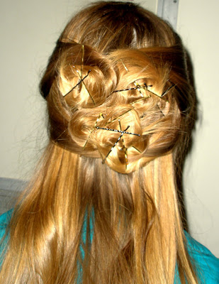 You girls with long hair can chose from several prom hair styles. half way up hairstyles