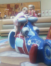 The girls on the 'Plane' at the play area