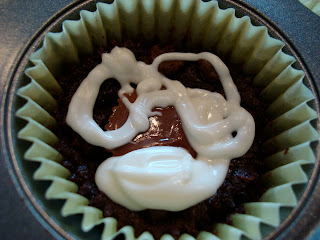 Overhead of one PB Cup Brownie Cupcake in liner