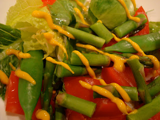 Mixed greens, vegetables topped with mustard