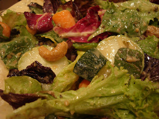 Close up of plated salad with cashews