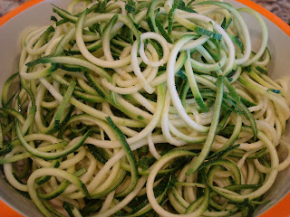 Close up of spiralized zucchini in bowl