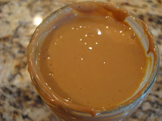 Peanut Sauce poured into a glass jar