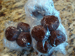 Chocolate Donut Holes wrapped in bundles in plastic wrap