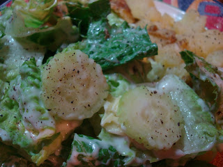 Close up of Mixed Salad with Homemade Creamy Tahini "Cesar" Dressing