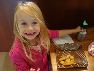 Young girl smiling eating stir fry