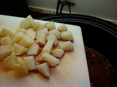Potatoes diced on cutting board
